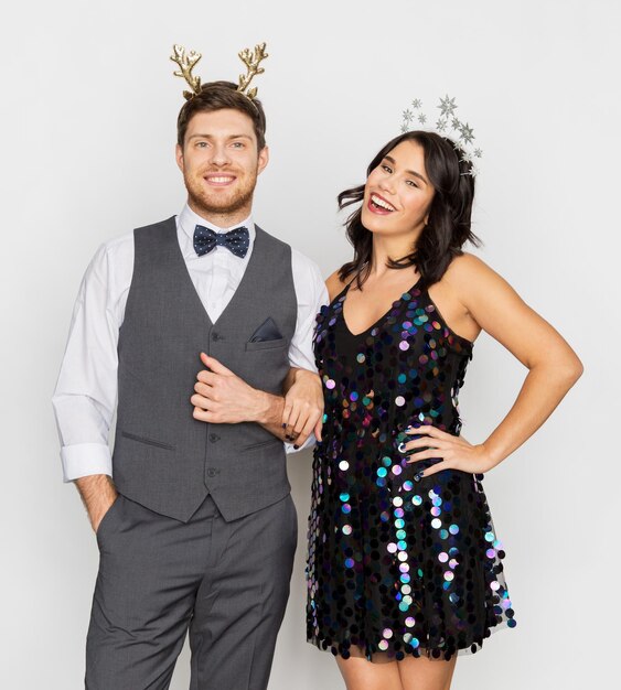Photo couple with christmas or new year party props