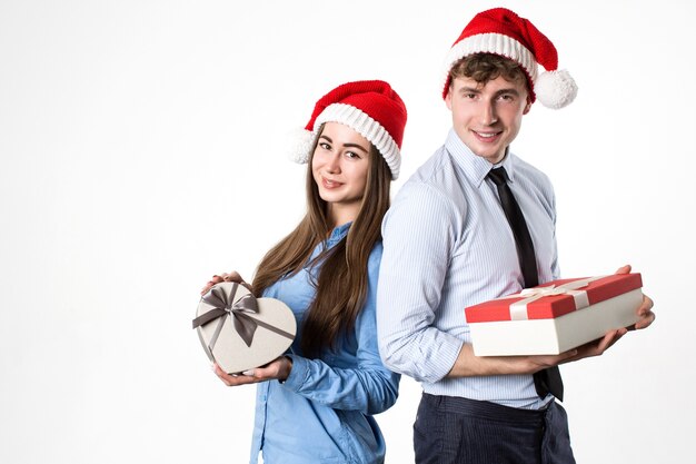 Couple with gifts in hands studio shot