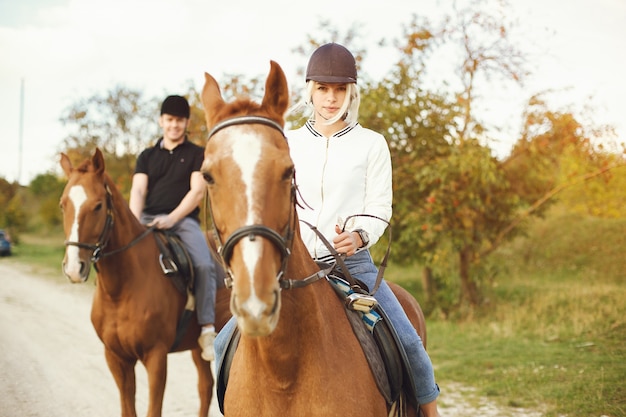 couple with horses