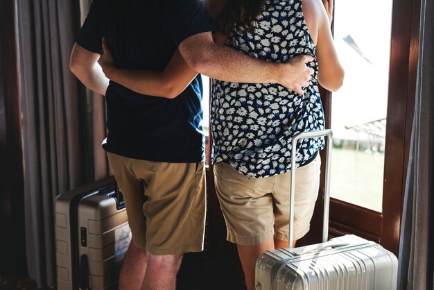 A couple with luggage