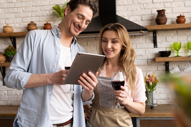 Photo couple with tablet medium shot