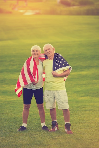 Couple with usa flag smiling