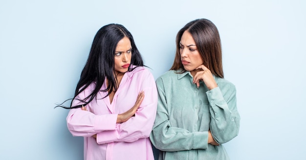 couple of women friends expressing a concept