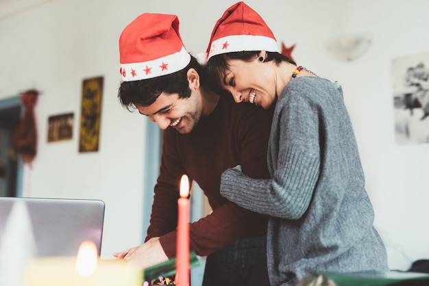  couple wrapping christmas presents