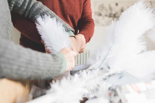  couple wrapping christmas presents