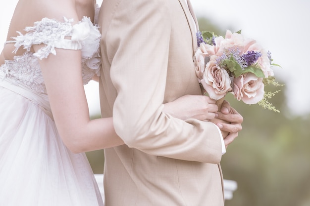 Couples holding hands together, symbolizes the couple's marriage use the illustrations 