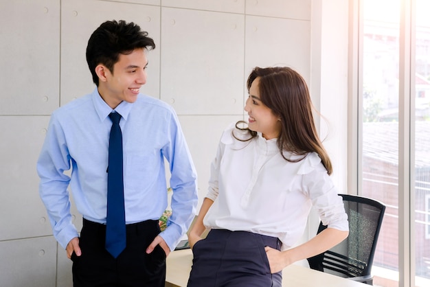 Couples smile at office