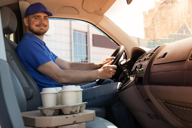 The courier delivers coffee and pizza by car