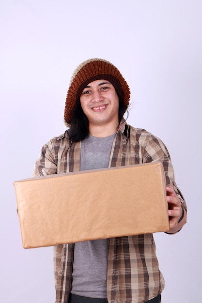 Courier delivery man giving box