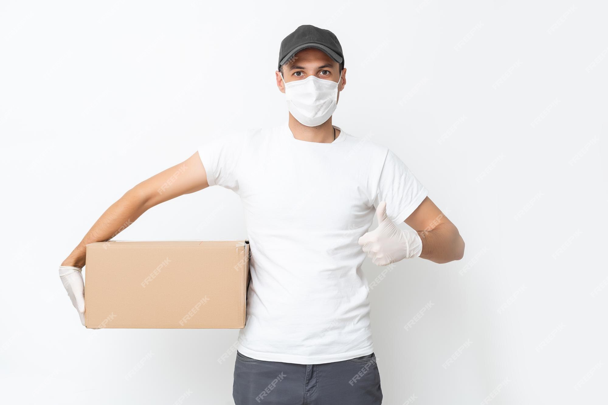 Courier Delivery Man In Medical Latex Gloves And Mask Safely