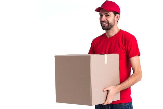 Courier man holding a big delivery box