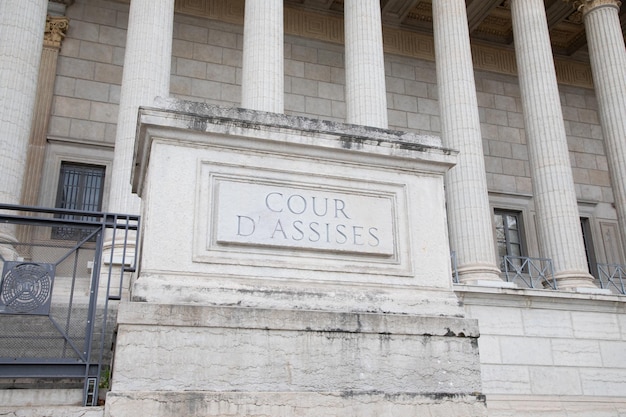 cours dassises sign text french facade entrance building means court of assizes in Lyon city france