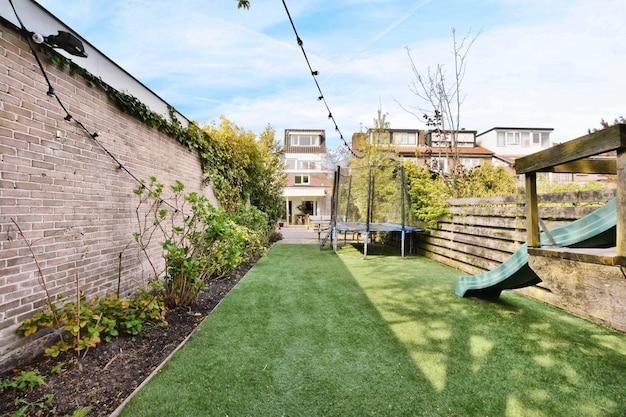 The courtyard of an elite house with trees and a garden