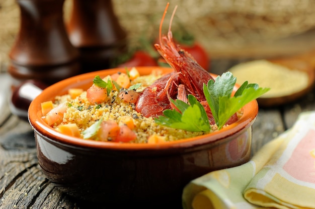 Couscous with seafood in a bowl