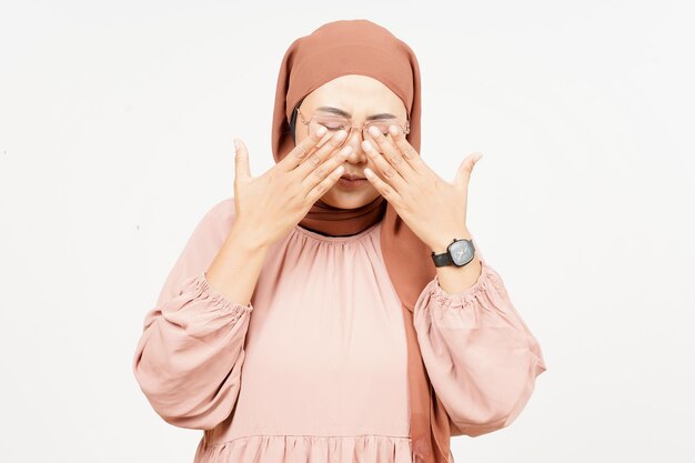 Covering eyes of Beautiful Asian Woman Wearing Hijab Isolated On White Background