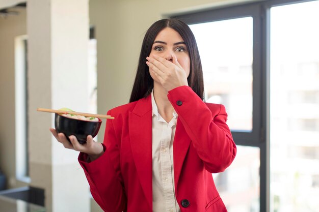 Covering mouth with a hand and shocked or surprised expression