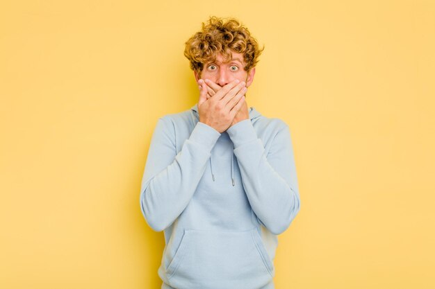 Photo covering mouth with hands looking worried