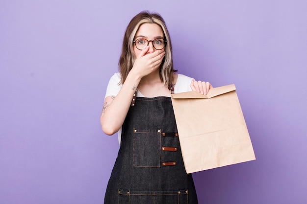 Covering mouth with hands with a shocked