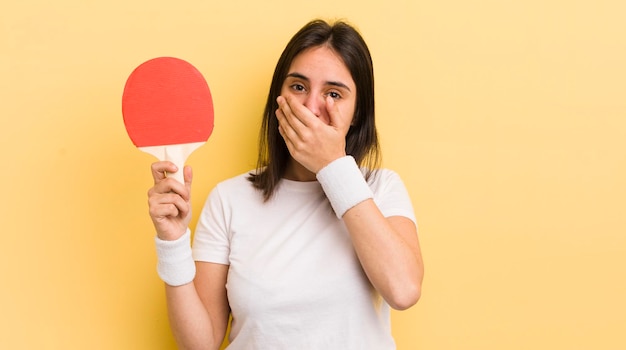 Covering mouth with hands with a shocked