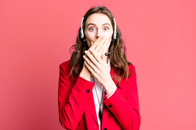 Photo covering mouth with hands with a shocked