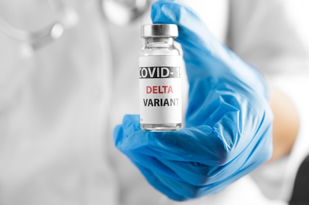 Covid 19 delta Variant vaccine in hand. vaccination against coronavirus