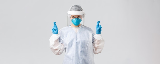 Covid preventing virus healthcare workers concept doctor or nurse in personal protective equipment m