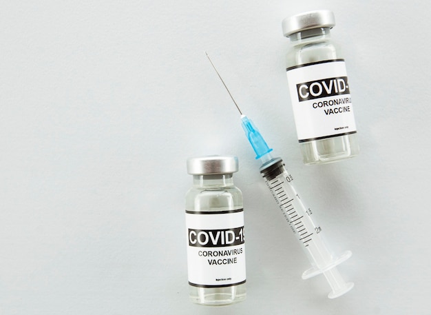 Covid19 coronavirus vaccine and syringe