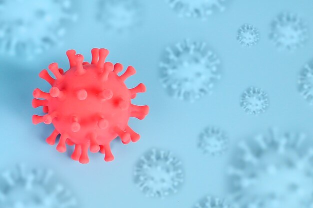 Covid19 virus cells on blue background for concept sick health care disease treatment and prevention