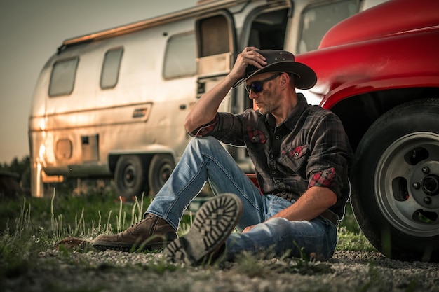 Cowboy Next to His Classic Pickup Truck