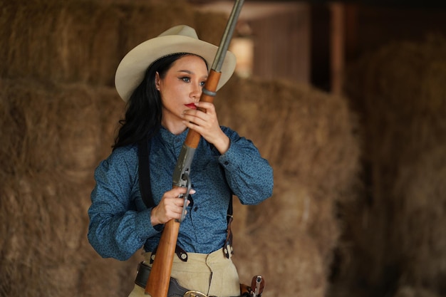 Cowgirl with rifle gunfight on texas ranch Western Vintage girl with gun