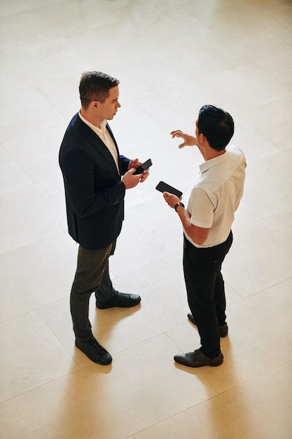 Coworkers discussing new app