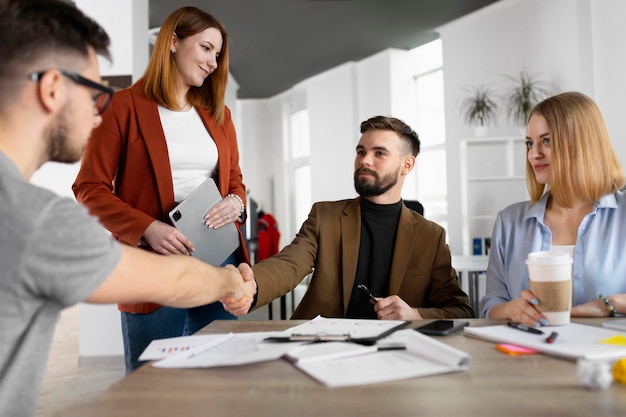 Photo coworkers having a meeting for a vacant job