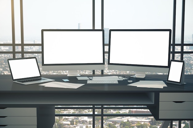 Photo coworking designer desktop with two computer screen