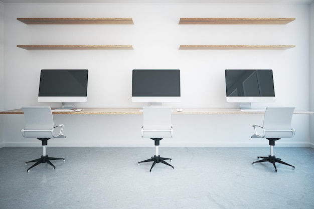 Photo coworking office with blank monitors