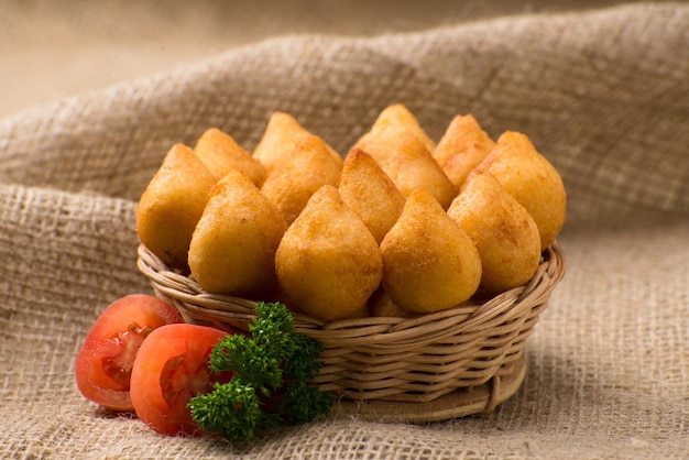 Coxinha , Brazilian savory fried chicken snack. 
( salgadinho )