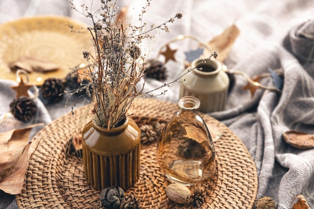 Cozy autumn composition with decorative details candles