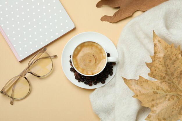 Cozy autumn concept background with coffee drink