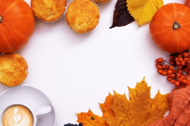 Cozy autumn flat lay with coffee pumkin sweater and copy space