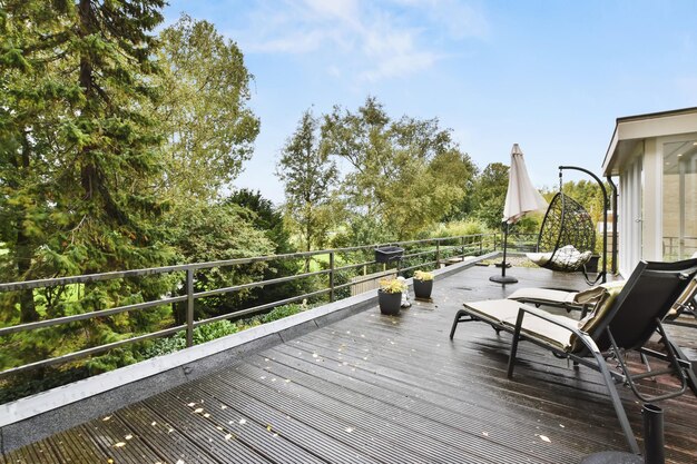 Cozy balcony with black sun beds