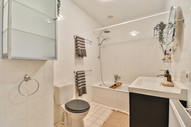 Cozy bathroom with toilet tub and ceramic sink under a round mirror