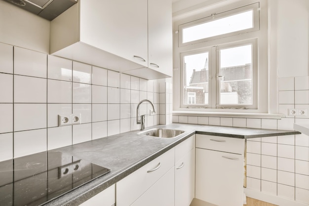 Cozy bright kitchen with a black countertop