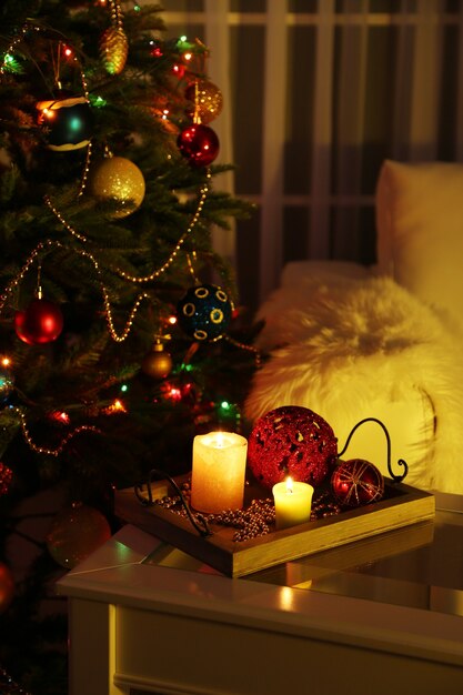 Cozy Christmas interior with decorated Christmas tree