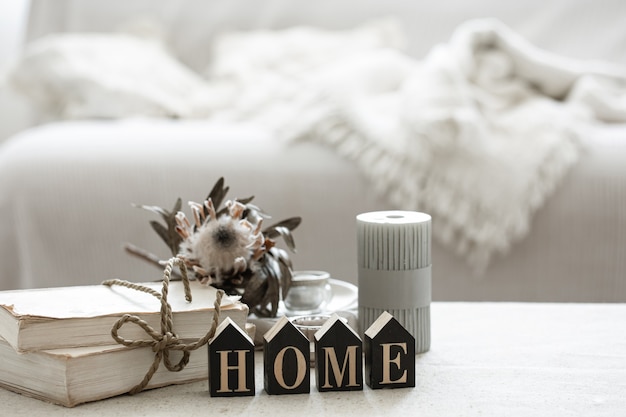 a cozy composition with details of the interior decor and the decorative word home.