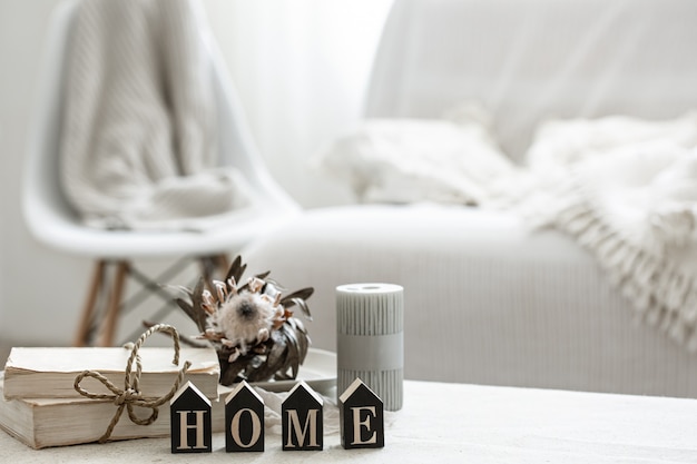 Photo a cozy composition with details of the interior decor and the decorative word home.