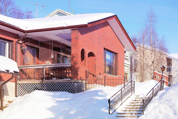 Cozy Cottage and staircase in winter Rovaniemi, Finland.