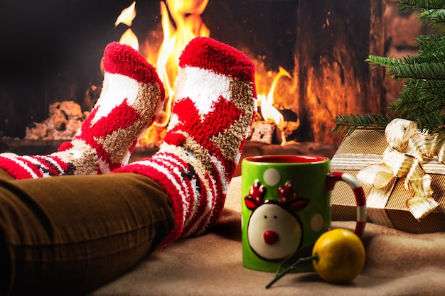 Cozy holiday evening near a fireplace