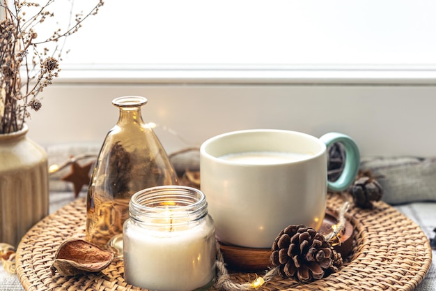 Cozy home composition with coffee cup and home decor details