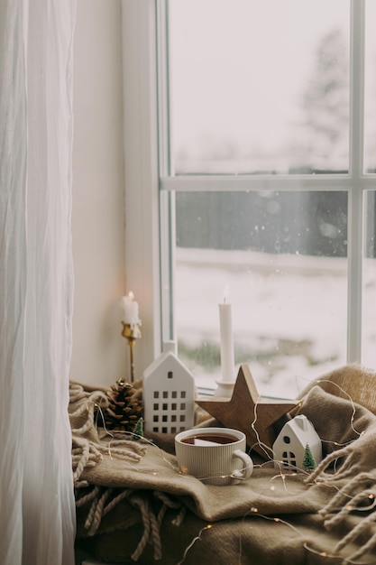 Cozy home at snowy day Winter hygge Atmospheric scandinavian mood