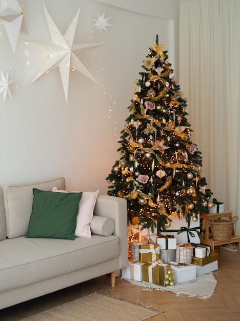 Cozy interior with decorated christmas tree christmas and new year concept