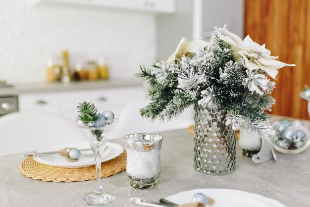 Photo cozy modern christmas interior design idea for kitchen space, decorated in silvers and blue